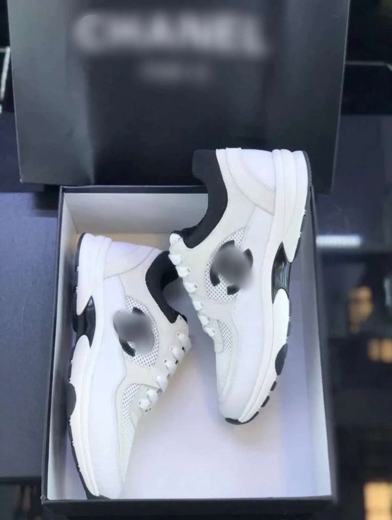 C white & black trainers